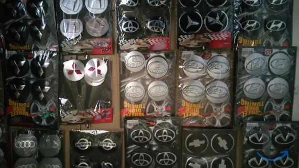 Наклейки на колпачки в Омске